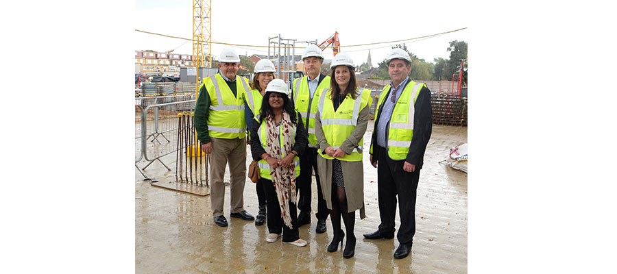 housing developments - London Borough of Hounslow Councillor and Leader of the Council, Steve Curran; A2Dominion Development Director, Doreen Wright; Hounslow West Cllr, Bandna Chopra; A2Dominion CEO, Darryl Mercer; London Borough of Hounslow Assistant Director of Planning & Development, Sarah Scannell and A2Dominion Development Director, Danny Lynch at the Bath Road construction site.